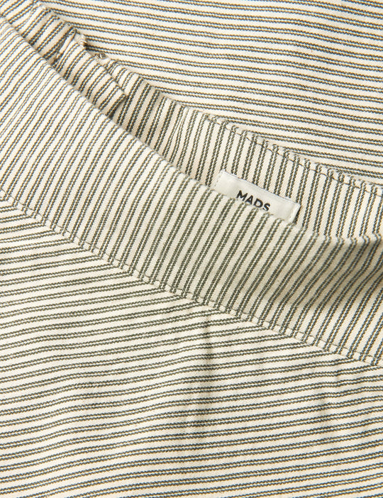 Mads Nørgaard Bromi Stelly Nederdel – A-formet nederdel fra Mads Nørgaard i grøn og grå. Knælang med høj talje, lynlås og lommer.