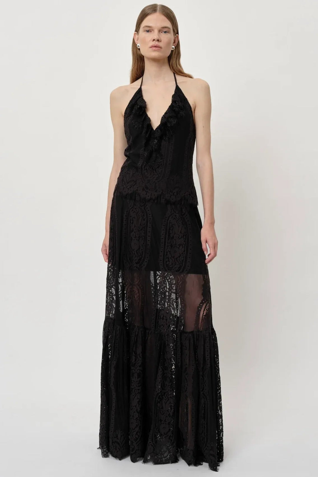 Herskind Patsy Skirt i sort – mid-waisted nederdel med A-form, volumen og underskørt. Fremstillet i OEKO-TEX bomuld og nylon.
