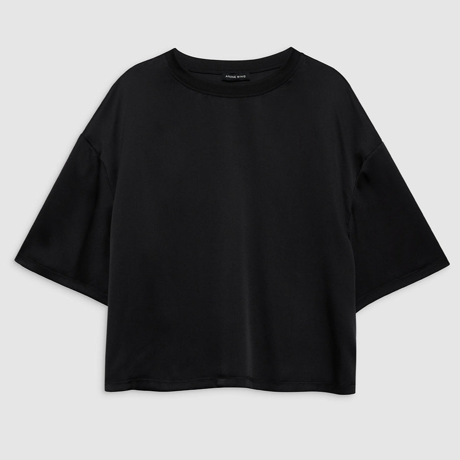 Anine Bing Imogen Top – luksuriøs silkebluse i 100% charmeuse med semi-skinnende finish, oversized pasform og elegante detaljer.