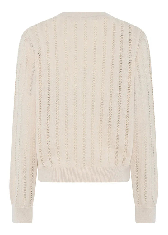 La Rouge Anette Cardigan i Sand – let og feminin cardigan i 100 % økologisk bomuld med smukt pointellemønster. Perfekt til lag-på-lag styling.