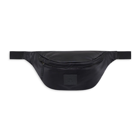 Anine Bing Leon Waist Bag i sort nylon med justerbar rem og lynlåslukkede rum. En moderne, praktisk taske med eksklusive læderdetaljer.