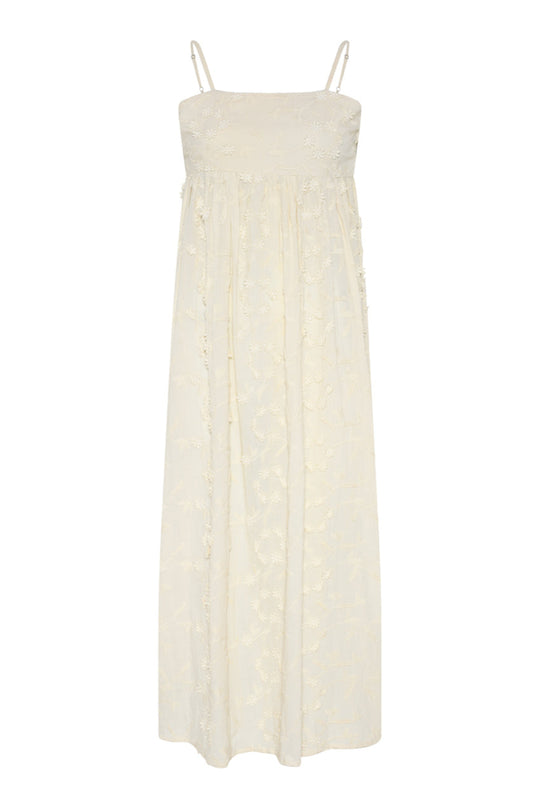 Feminin sommerkjole fra La Rouge i 100% bomuld med 3D-blomster og smøg-effekt i ryggen. Shop Britt Dress i creme online hos