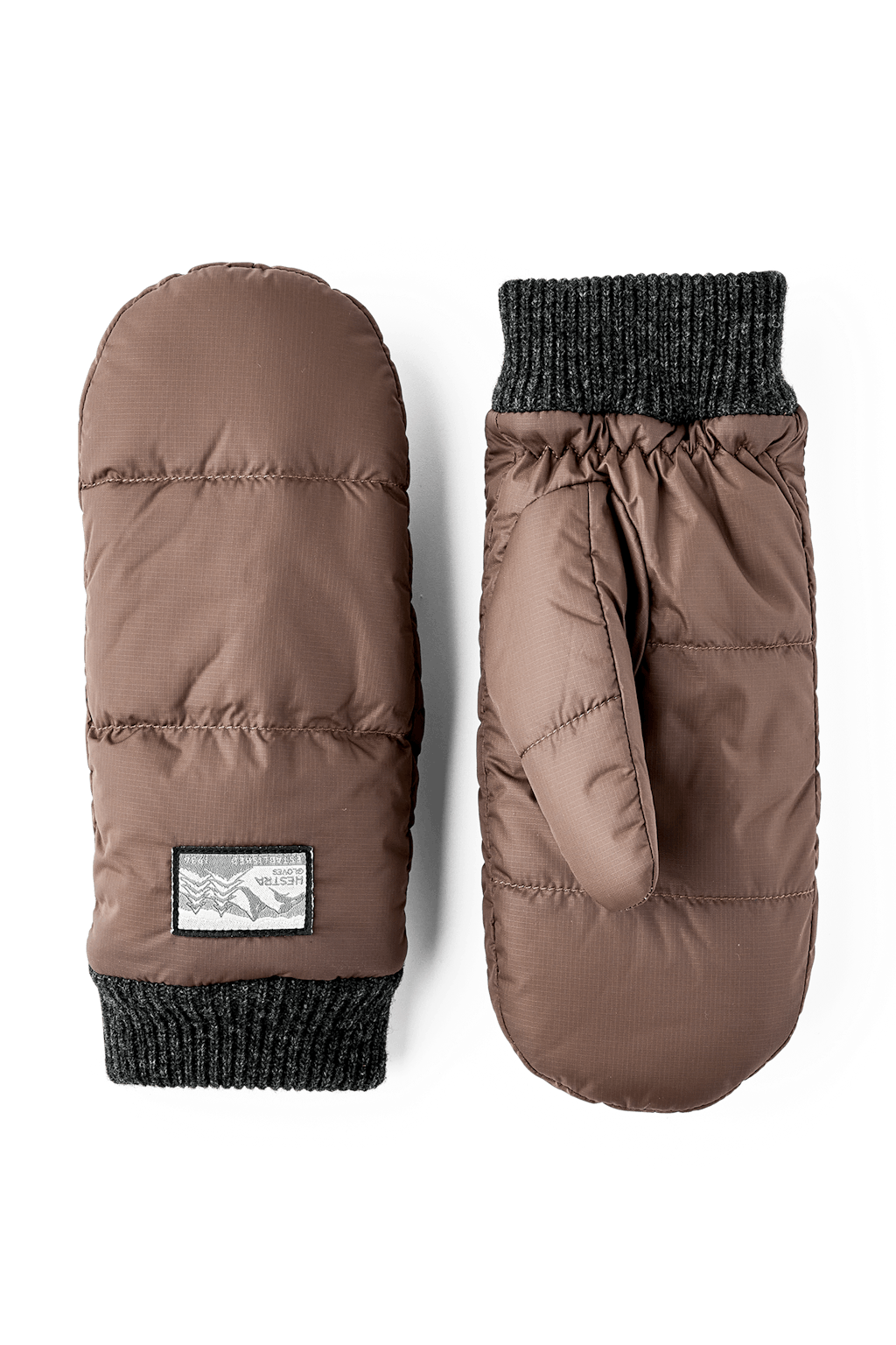 Hestra Otra Luffer i chocolate – quiltede, vindtætte og vandafvisende luffer med PrimaLoft Gold isolering og blødt børstet polyesterfor. 