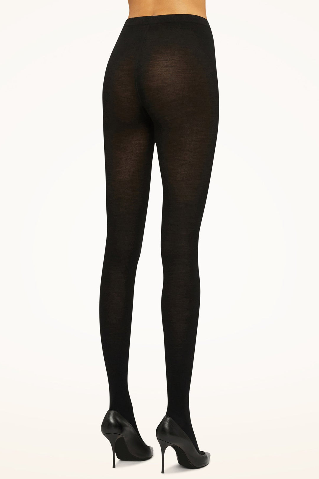 STYLE: 11310 FARVE: 7005. Wolford Merino uldstrømpebukser, 200 denier. Blødt merino uld, der holder dig varm og behagelig hele dagen.  