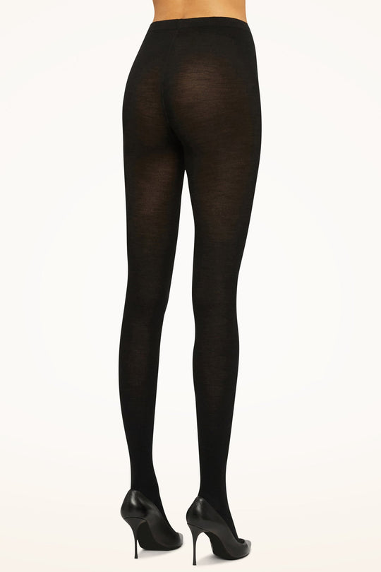 STYLE: 11310 FARVE: 7005. Wolford Merino uldstrømpebukser, 200 denier. Blødt merino uld, der holder dig varm og behagelig hele dagen.  