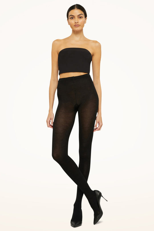 STYLE: 11310 FARVE: 7005. Wolford Merino uldstrømpebukser, 200 denier. Blødt merino uld, der holder dig varm og behagelig hele dagen.  