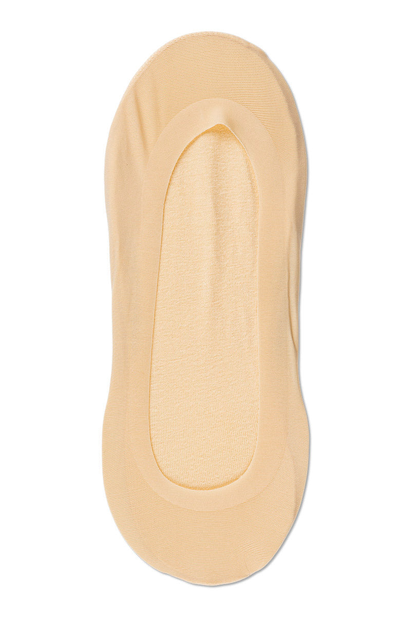 Note by Syversen Lacer Cut Step i skin – usynlige steps med silikonekant og blød bomuldssål.
