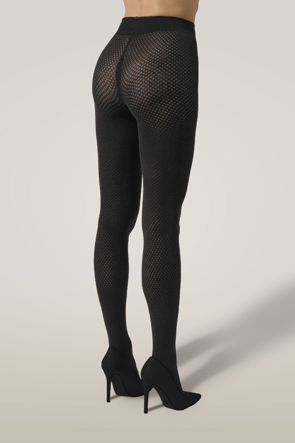 Wolford Cotton Dot Tights i sort, strømpebuks i bomuldsblanding med et all-over polka dot-mønster og blød linning.