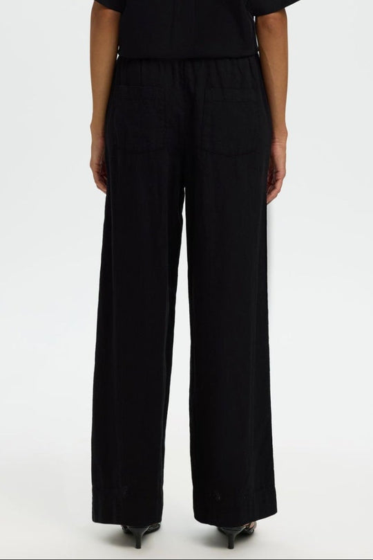 Selected Femme Luisa bukser i sort med vide ben og elastisk talje.