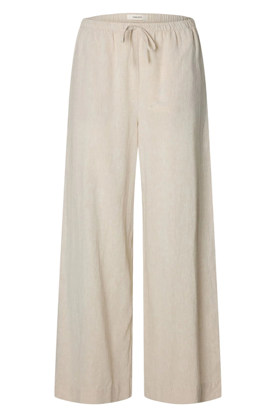 Selected Femme Luisa bukser i sandshell med vide ben og elastisk talje.