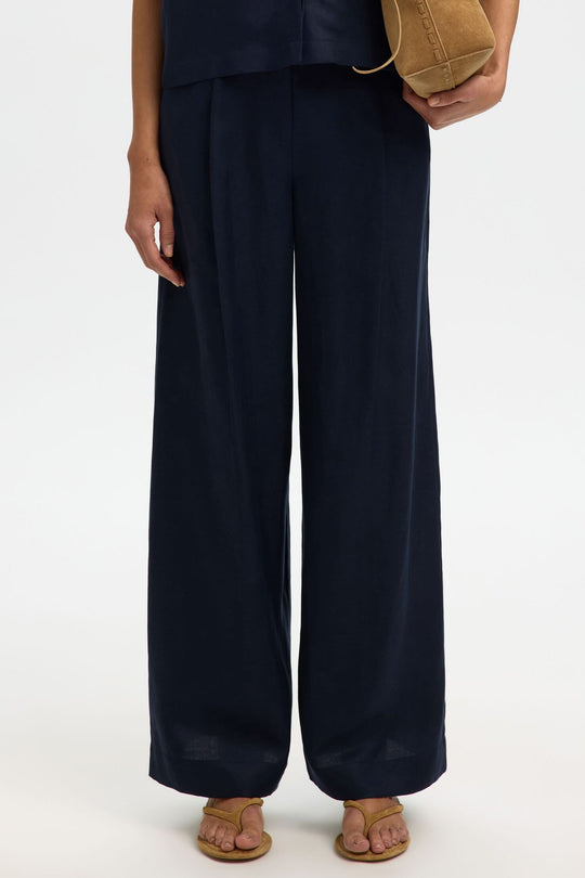 Selected Femme Lyra bukser i dark sapphire med wide fit og høj talje.