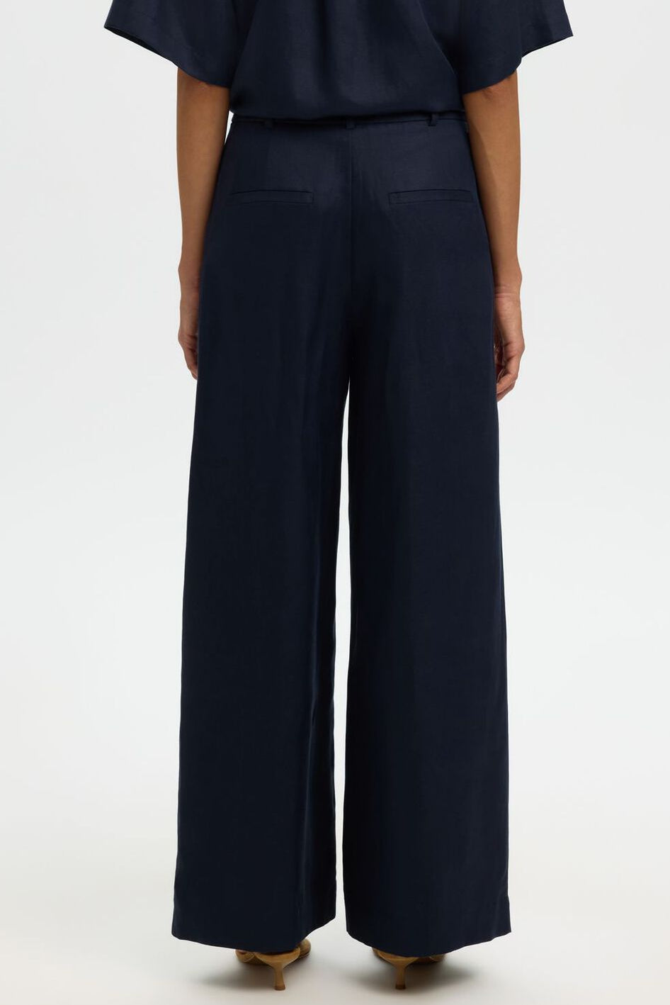 Selected Femme Lyra bukser i dark sapphire med wide fit og høj talje.