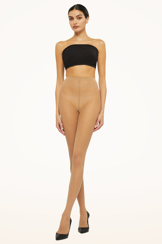 Wolford Individual 10 denier strømpebukser i fairly light.