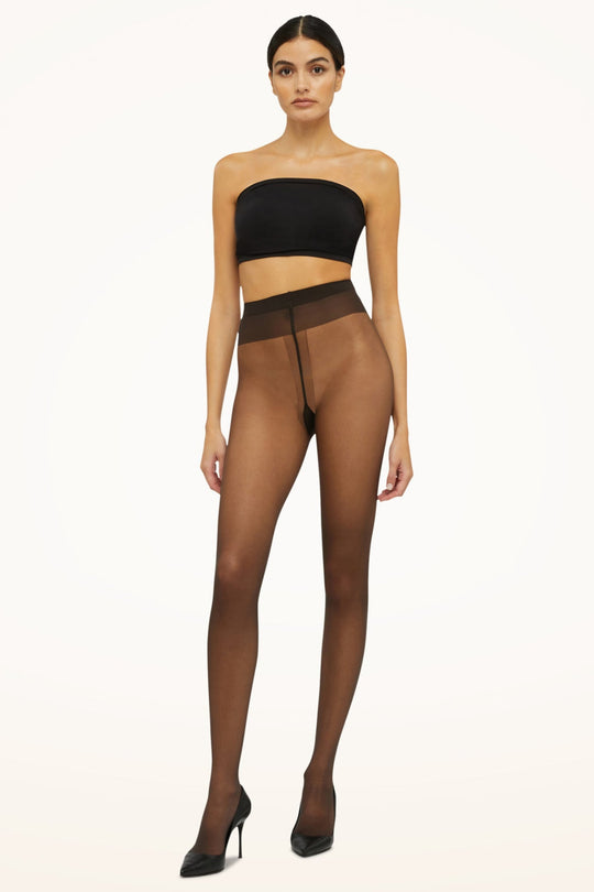 Wolford Individual 10 denier strømpebukser i nearly black.