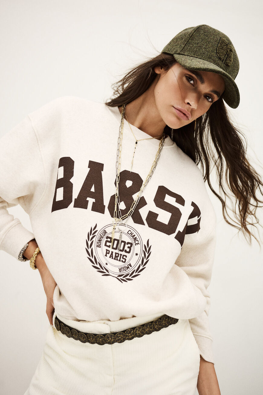 ba&sh Fenja Sweat i beige chiné – cropped sweatshirt med rund hals, ribkanter og loose fit for et casual, campus-inspireret look.
