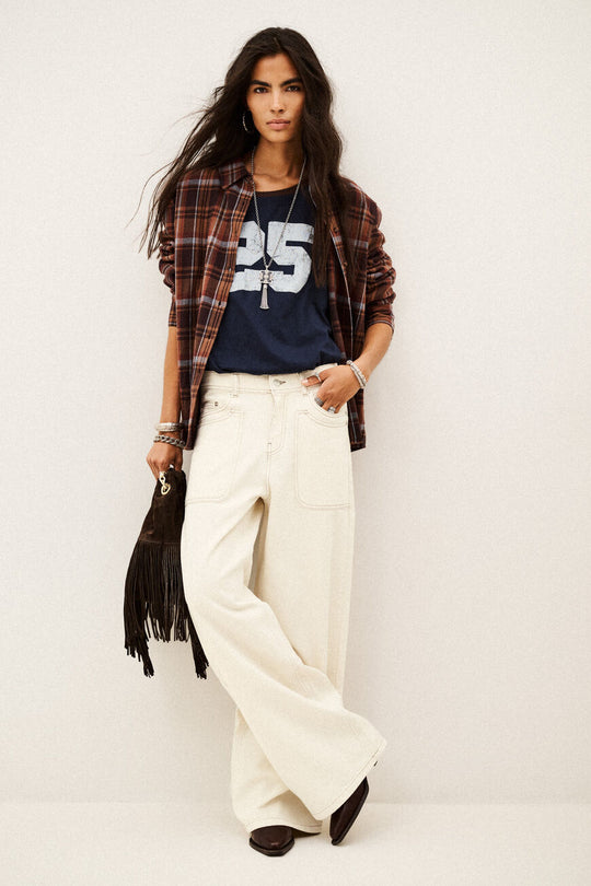 ba&sh Zoel jeans i ecru med cargo-inspirerede lommedetaljer.