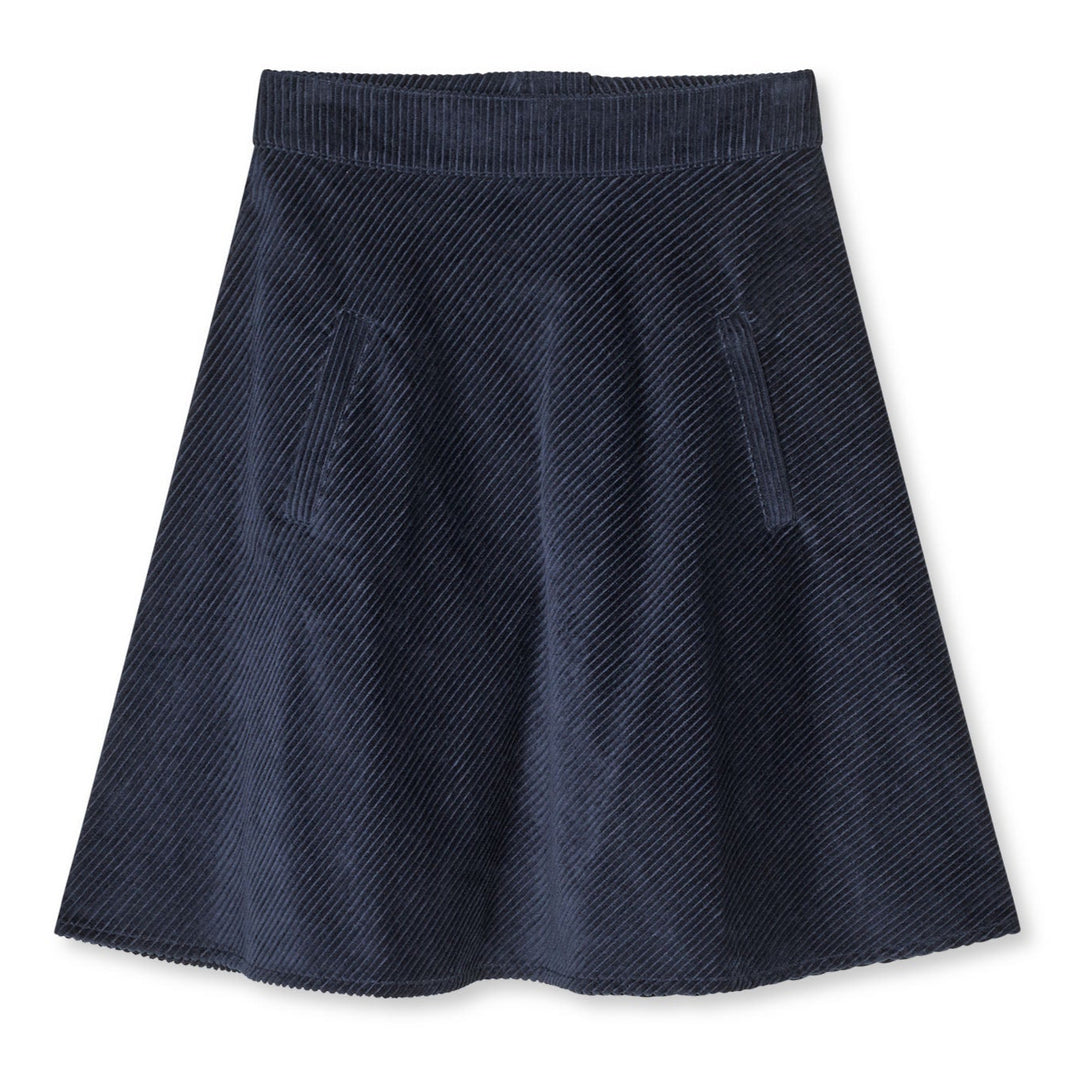 Pretty Cord Stelly Skirt i Parisian Night: A-formet midi-nederdel i 100 % økologisk bomuld med høj talje og sidelommer. Elegant og bæredygtig. 
