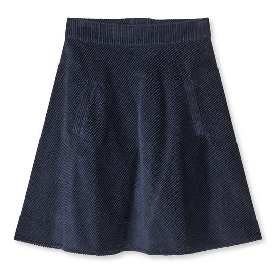 Pretty Cord Stelly Skirt i Parisian Night: A-formet midi-nederdel i 100 % økologisk bomuld med høj talje og sidelommer. Elegant og bæredygtig. 