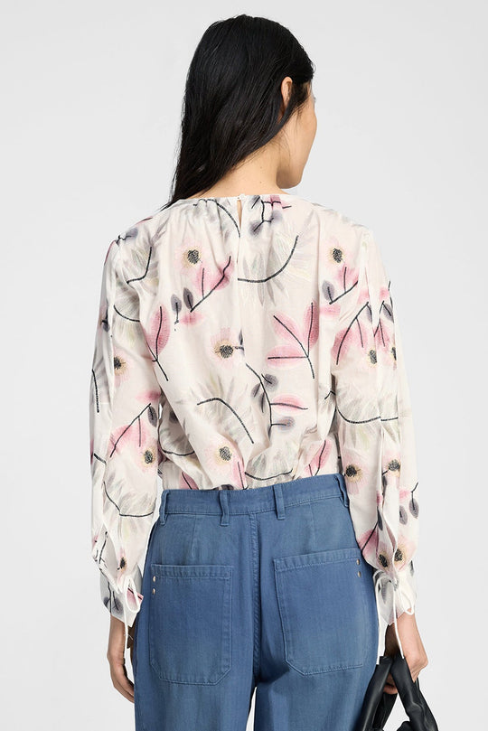 Munthe Bellanca bluse i Print Kit med blomsterprint, rund hals og lange ærmer med bindedetaljer.