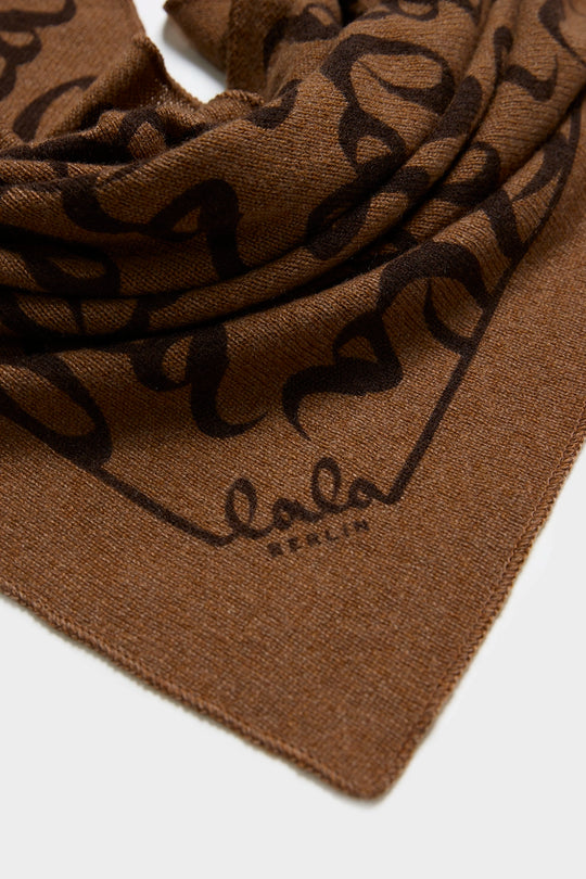 Detalje af Lalagram cashmere-tørklæde i tawny