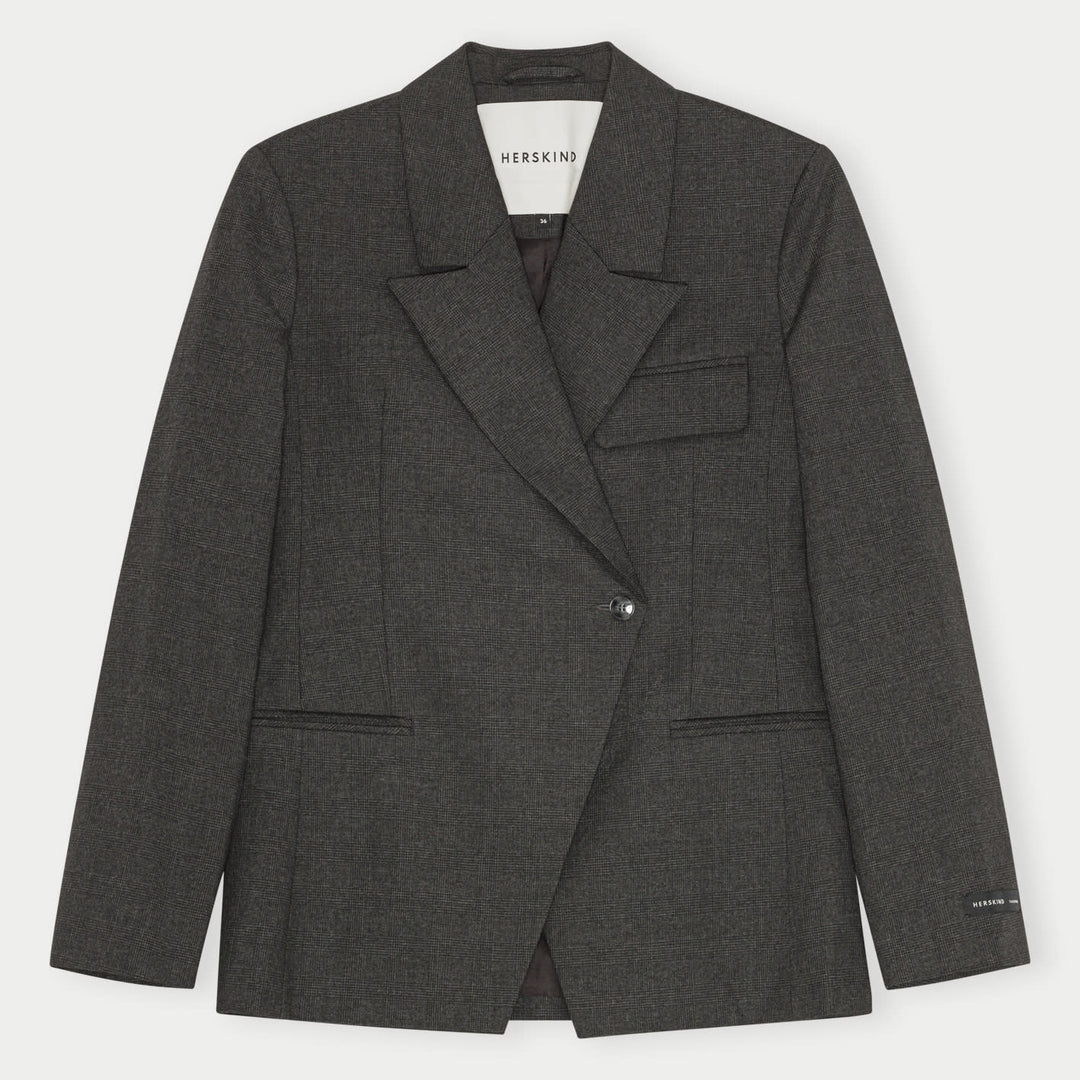 Herskind Oprah Regular Blazer i checks grey – struktureret blazer med paspolerede lommer og asymmetrisk frontlukning
