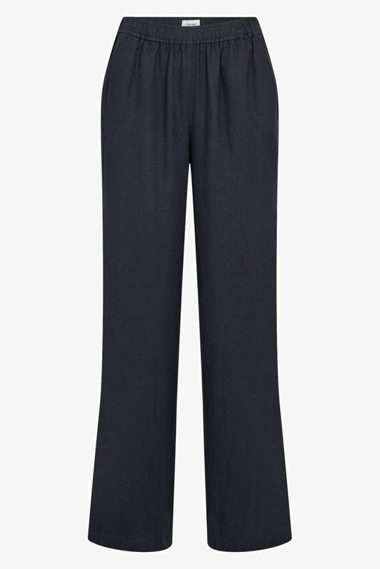 Leveté Room Naja 7 bukser i dark navy – lette bukser med elastisk talje og lige ben.