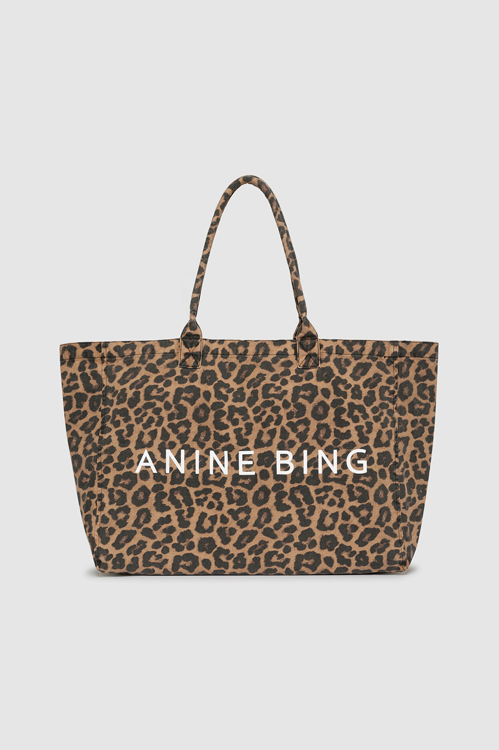 Anine Bing Leo Canvas Tote Black & Brown Leopard – stor canvas taske med leopardprint og hvid ANINE BING branding.
