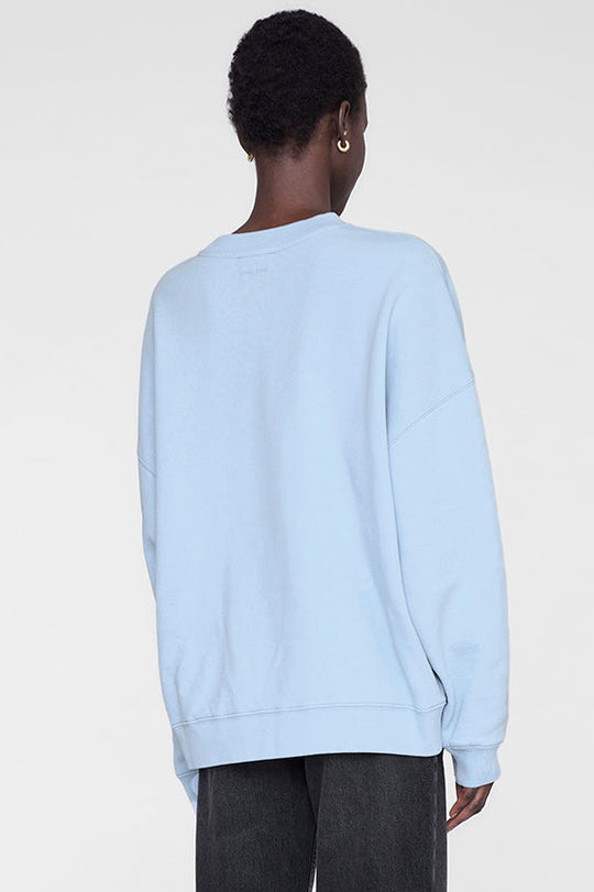 ANINE BING Miles Sweatshirt i pale blue, lyseblå oversized sweatshirt med hvidt ANINE BING-logo på brystet.
