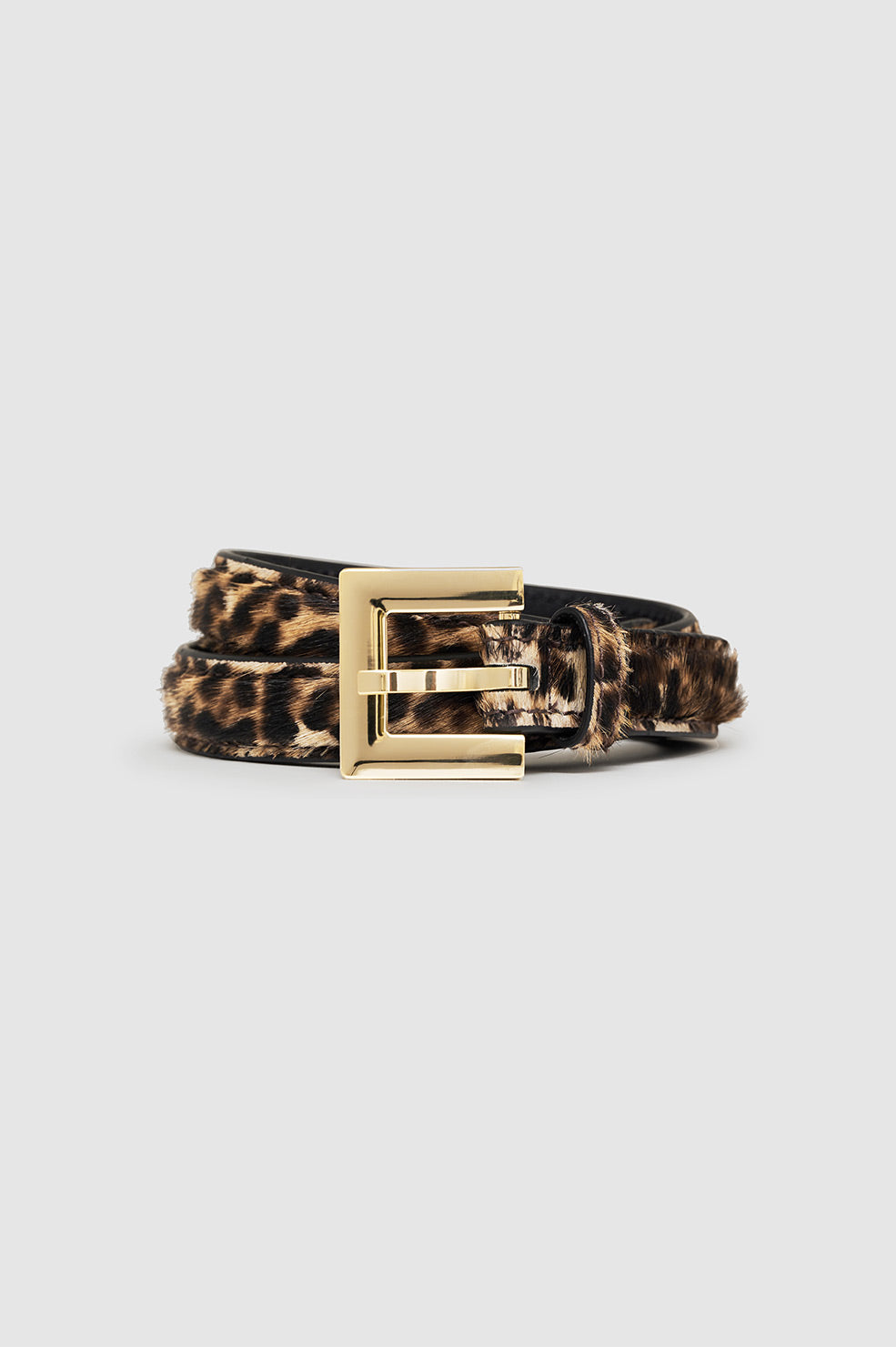 Anine Bing Nicola Belt – Leopard Calf Hair bælte med gyldent firkantet spænde og small polstret rem i ægte kalvehår.
