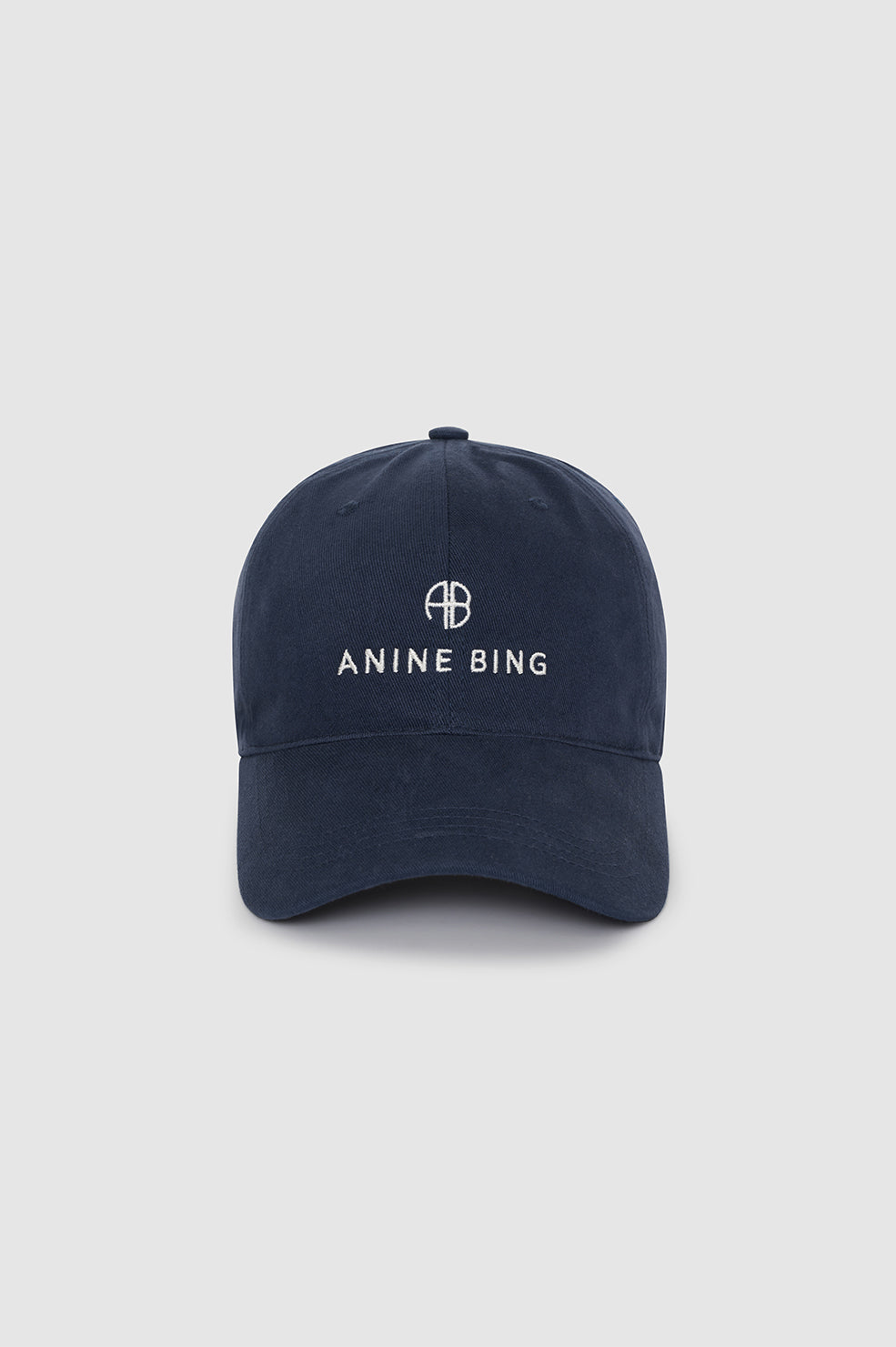 Anine Bing kasket i washed navy med broderet logo. 