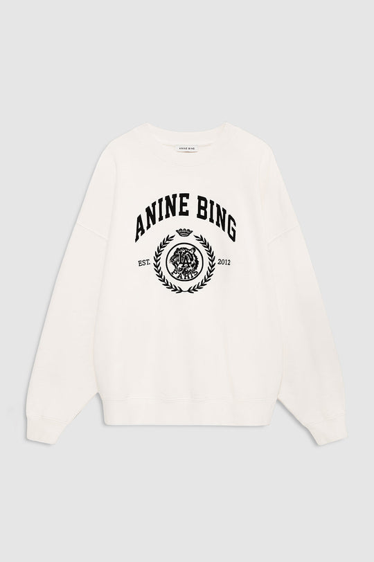 Anine Bing Miles Collegiate Sweatshirt i cream – oversized sweatshirt i bomuldsfleece med ribkanter og collegiate ANINE BING-logo foran.
