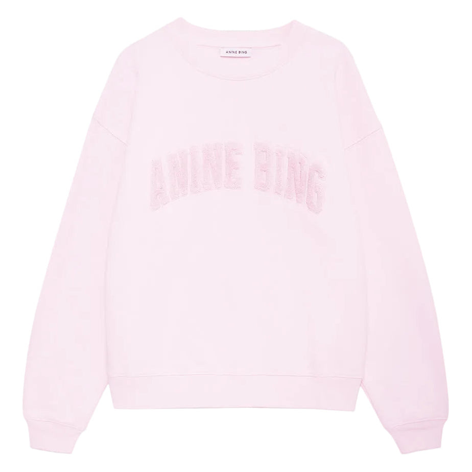 Anine Bing Spencer Sweatshirt i powder pink – cropped og boxy sweatshirt i bomulds French terry med tekstureret ANINE BING-logo på brystet.
