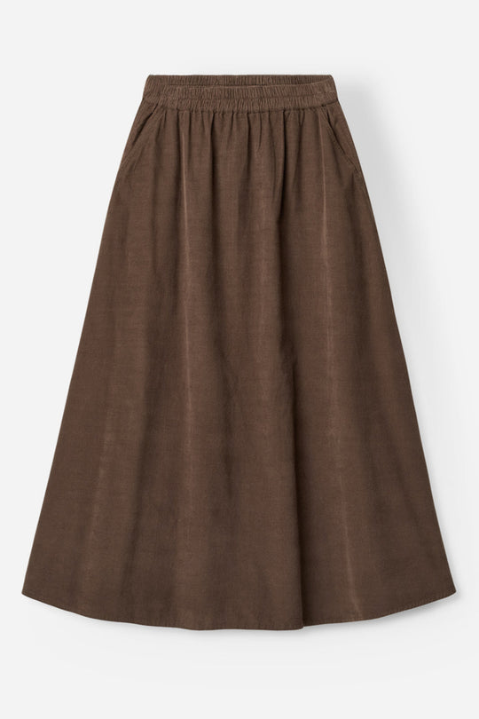 Project AJ117 Hailey DK21-253 Nederdel i Coffee – midi-længde nederdel i blød baby-corduroy med elastik i taljen og skrå frontlommer. Fremstillet i 100% økologisk bomuld.

