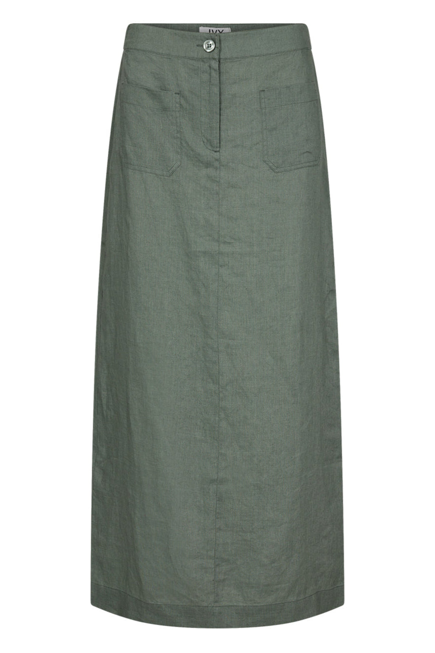 Opdag IVY Copenhagen Augusta 70's Linen Skirt i Dusty Steel Green – en åndbar, funktionel og stilfuld midi-nederdel. Tidløs og alsidig. 