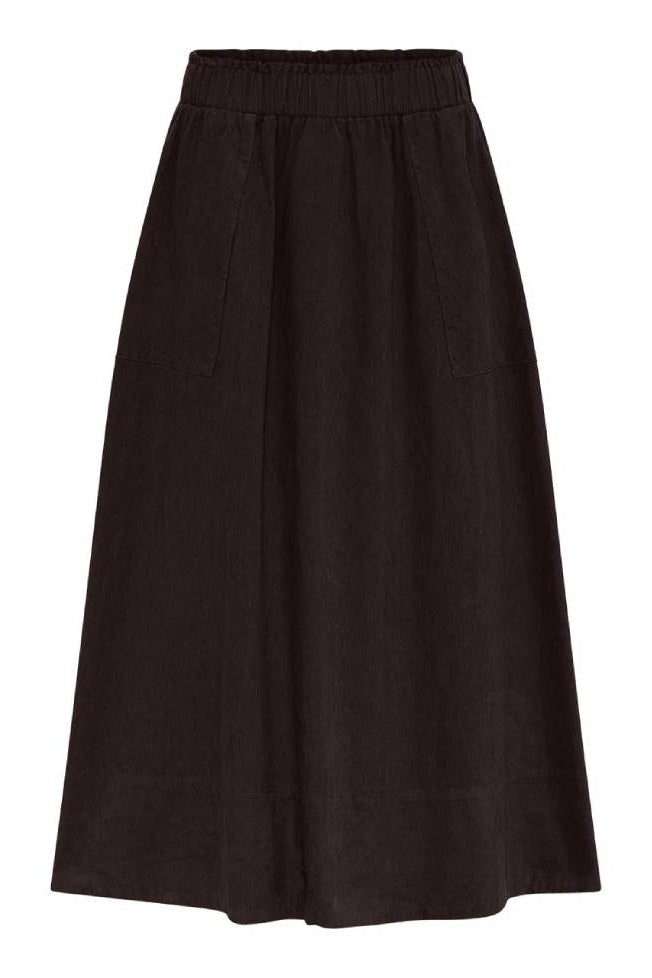 LA RŌUGE Vilma Skirt i dark brown babyfløjl – corduroy nederdel i 100% bomuld med flatterende pasform og sporty twist.
