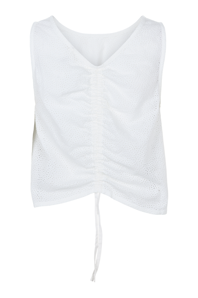 Basic Apparel Lotus Top i 100 % økologisk bomuld med broderet stof, bindebånd til to stylingmuligheder og afslappet fit. Bæredygtig og alsidig top. 