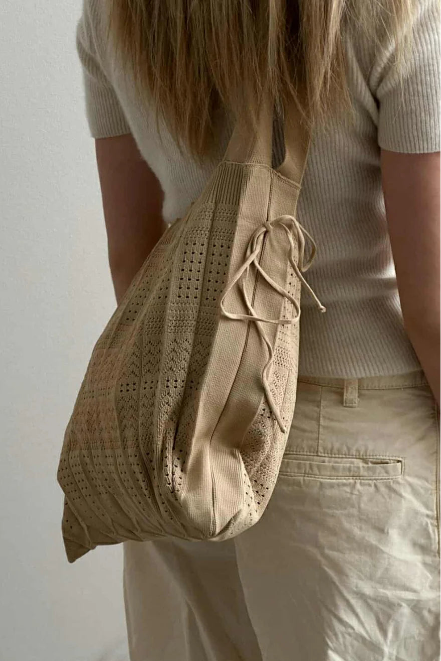 Pico Long Rosalia Bag vævet taske i polyester med en lang rem, velegnet som crossbody taske.