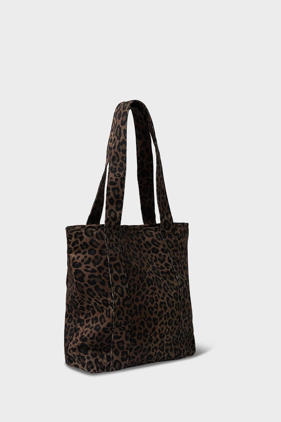 Lala Berlin Tova Carmela Tote i dark brown leo printet canvas – stor og robust taske til damer, perfekt til laptop, lunch og yndlingsbog, med stilfuldt og vildt design