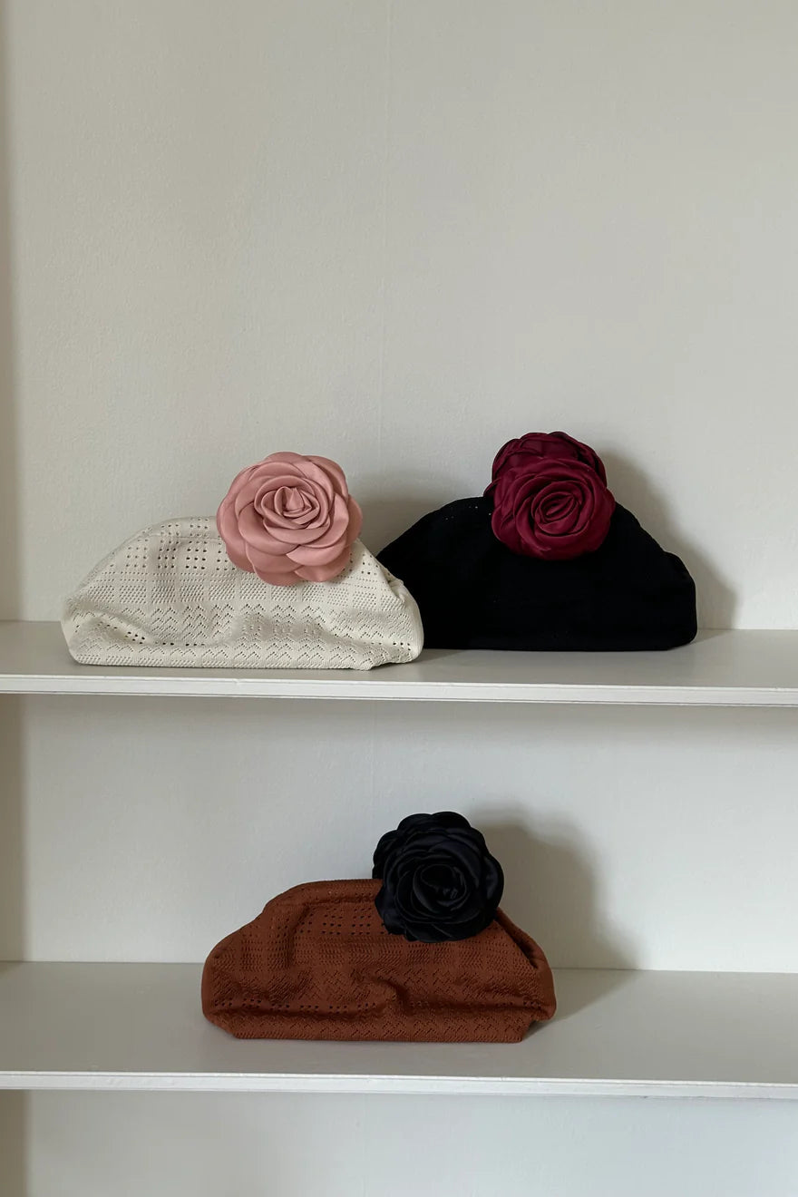 Pico Rosalia Clutch, håndlavet clutch taske i vævet polyester med let rundet form.