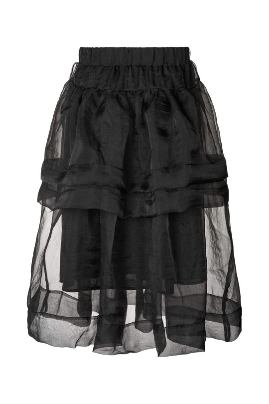 Skil dig ud med Rabens Saloner Falka Organza nederdel i sort. Voluminøst, transparent design med elastisk talje. Perfekt til både fest og hverdag.
